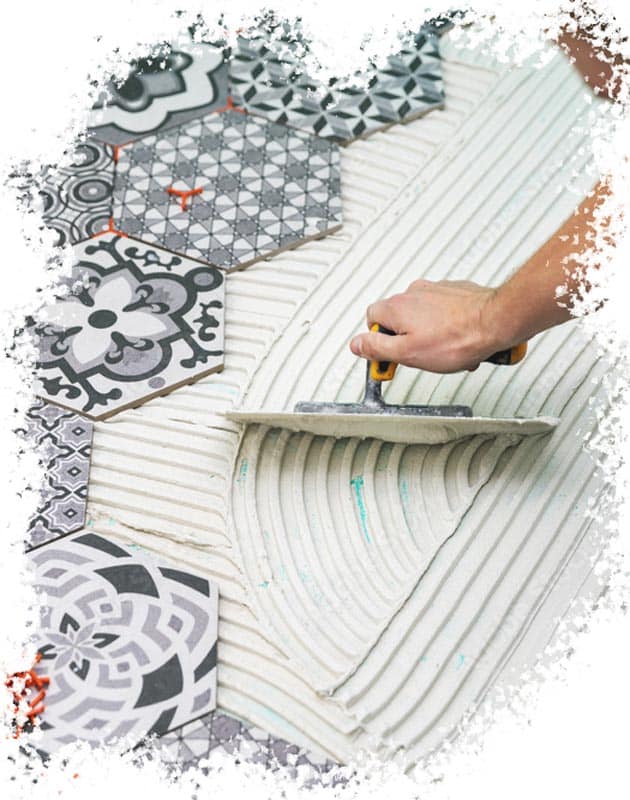 artisan pose carrelage truelle colle